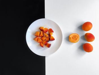 High angle view of fruits in plate on table