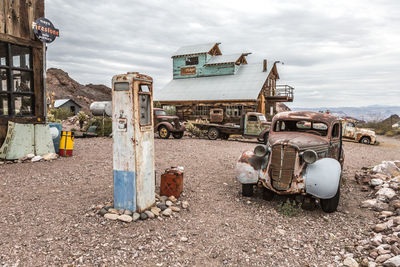 Abandoned truck against sky