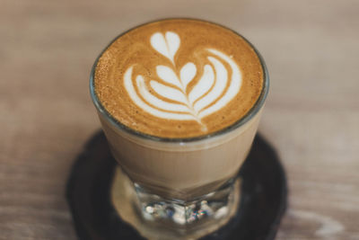 Close-up of cappuccino on table