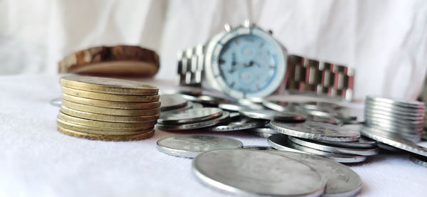 Close-up of coins on table