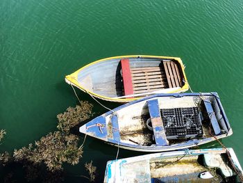 High angle view of old boat moored on lake