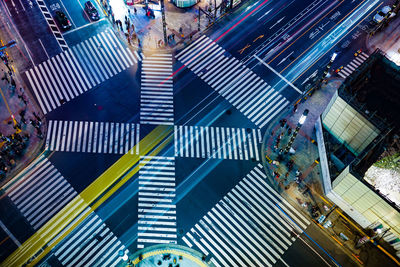 High angle view of people crossing road