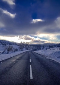 Road against sky during winter