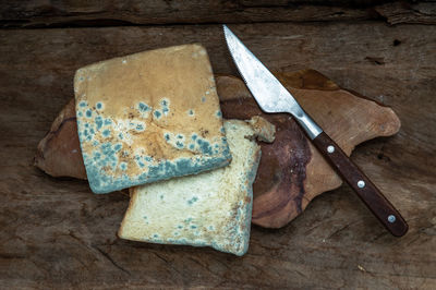 High angle view of bread on cutting board