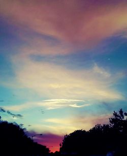 Low angle view of dramatic sky at sunset