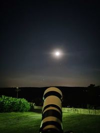 Scenic view of field against sky at night