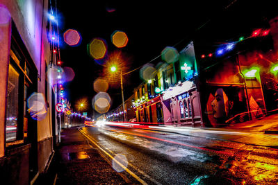 Light trails on city street at night