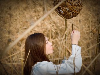 Woman looking at nest