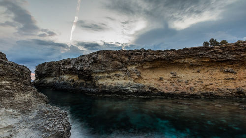 Panoramic view of cliff against sky