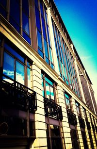 Low angle view of building against blue sky