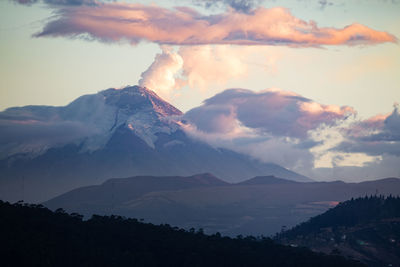 Scenic view of mountains against sky during sunset