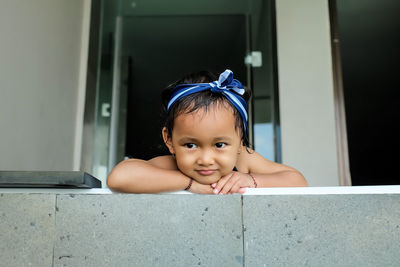 Portrait of cute girl at home