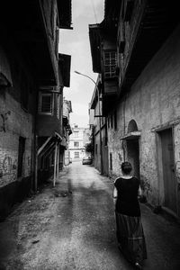 Narrow alley in front of building