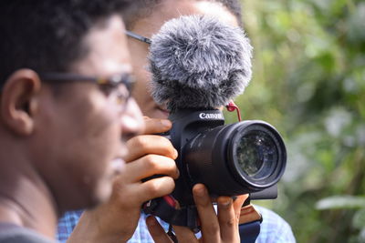 Portrait of man photographing