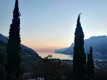 Scenic view of mountains against sky at sunset