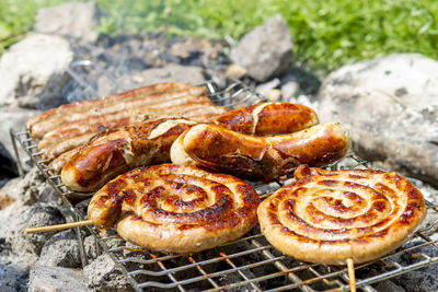 Close-up of meat on barbecue grill