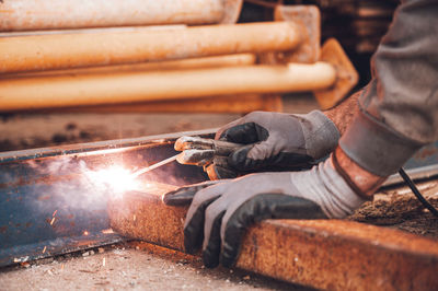 Man working on metal structure