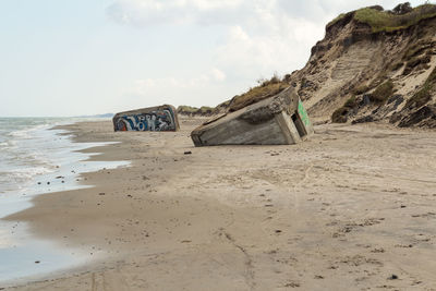 Scenic view of beach against sky