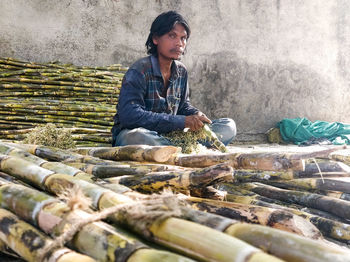 Full length of man working on wood