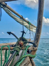 Sailboat on sea against sky