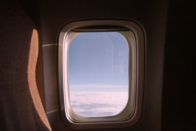 View of airplane through window