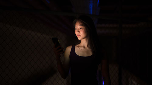 Portrait of young woman looking away