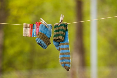Close-up of socks on clothesline
