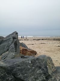 Scenic view of beach against clear sky