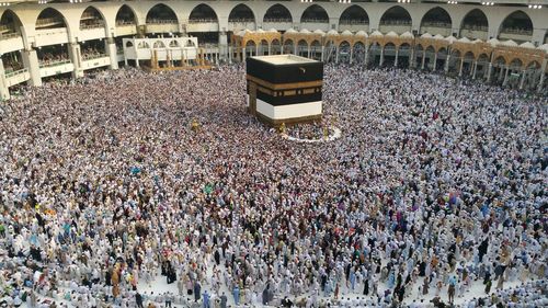 High angle view of group of people in front of building