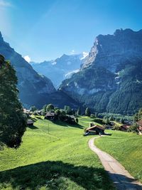 Scenic view of landscape and mountains against sky