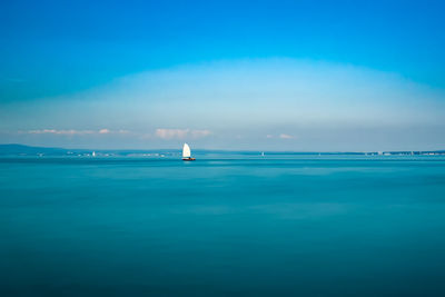 Scenic view of blue sea against sky