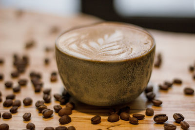 Close-up of coffee cup on table