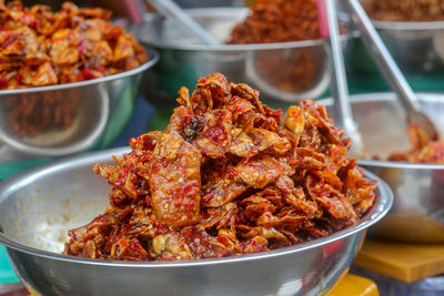 Closeup of deep fried fish - traditional vietnamese cuisine in dam market, nha trang city, khanh hoa