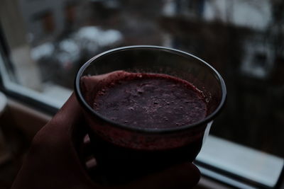 Close-up of person holding drink