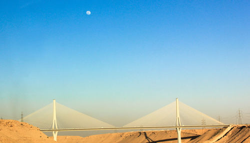 Low angle view of built structure against clear blue sky