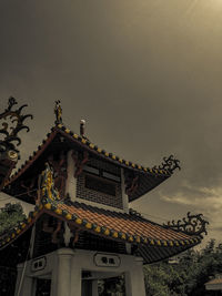 Low angle view of traditional building against sky