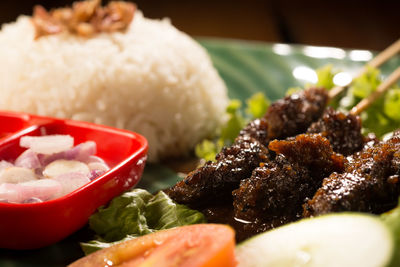 Close-up of salad served in plate on table