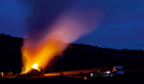 Panoramic view of trees at night