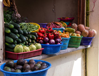 Fresh fruits and vegetables for sale in market stall