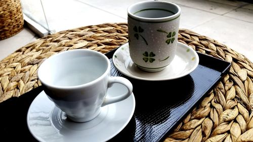 High angle view of coffee cup on table