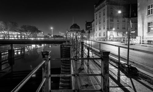 Illuminated buildings in city at night