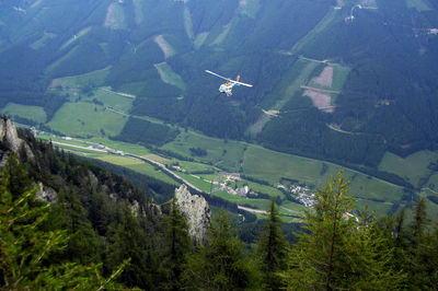 Helicopter in the air, use of helicopters in avalanche control and civil protection