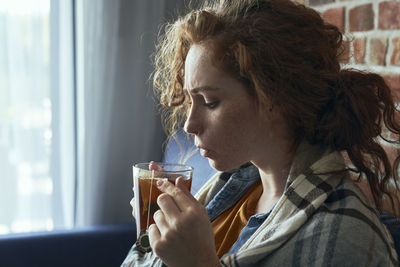 Young woman using mobile phone