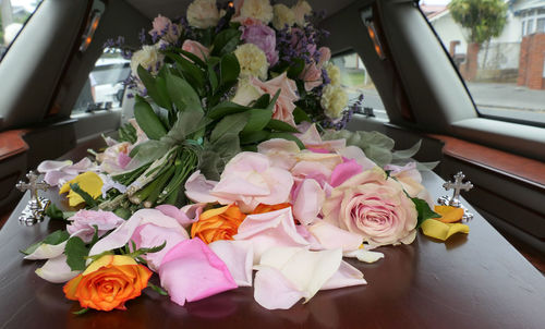 Close-up of pink flowers on table