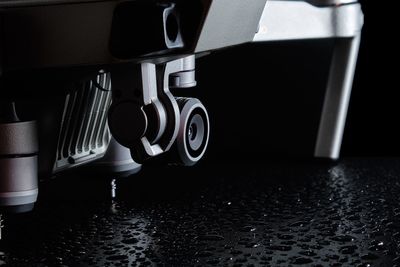 Close-up of electric lamp on table at home