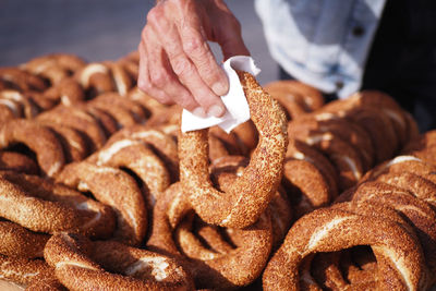 Midsection of man holding food