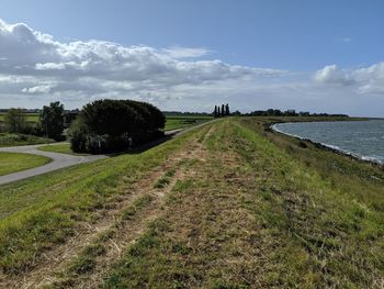 Scenic view of land against sky