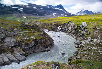 A wild, turbulent mountain river in the sarek national park, sweden. 