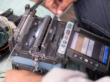 Midsection of person photographing
