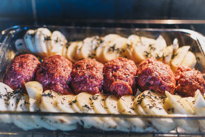 Close-up of meat on barbecue grill